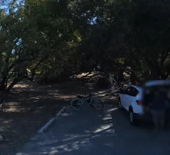 Leo Carrillo site 43, 360 photo: one car parked, a person and bicycle nearby, faces blurred