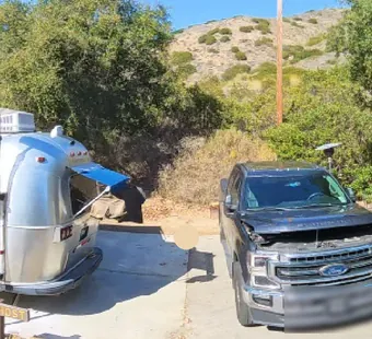 Leo Carrillo site 44, 360 photo: vintage aluminium travel trailer with awnings out