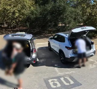 Leo Carrillo site 60, 360 photo: two vehicles with trunks open, a group loading gear, faces blurred