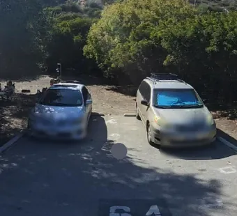 Leo Carrillo site 64, 360 photo: two cars, one silver and one gold, parked side by side