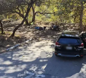 Leo Carrillo site 76, 360 photo: one car parked, gear and bikes on the ground nearby