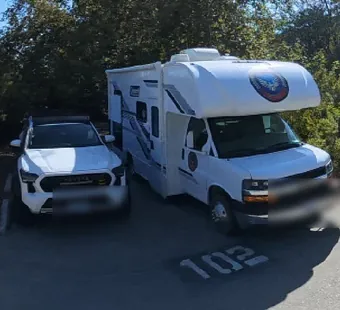 Leo Carrillo site 102, 360 photo: truck with a cab-over camper and a car parked together