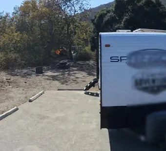 Leo Carrillo site 111, 360 photo: large travel trailer backed onto the pad