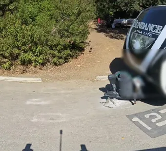 Leo Carrillo site 127, 360 photo: large fifth-wheel trailer parked, faces blurred nearby