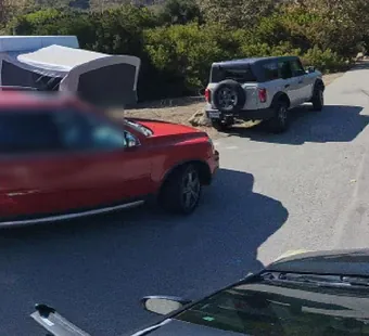 Leo Carrillo site 128, 360 photo: red suv, a jeep and a truck with a rooftop tent parked close together